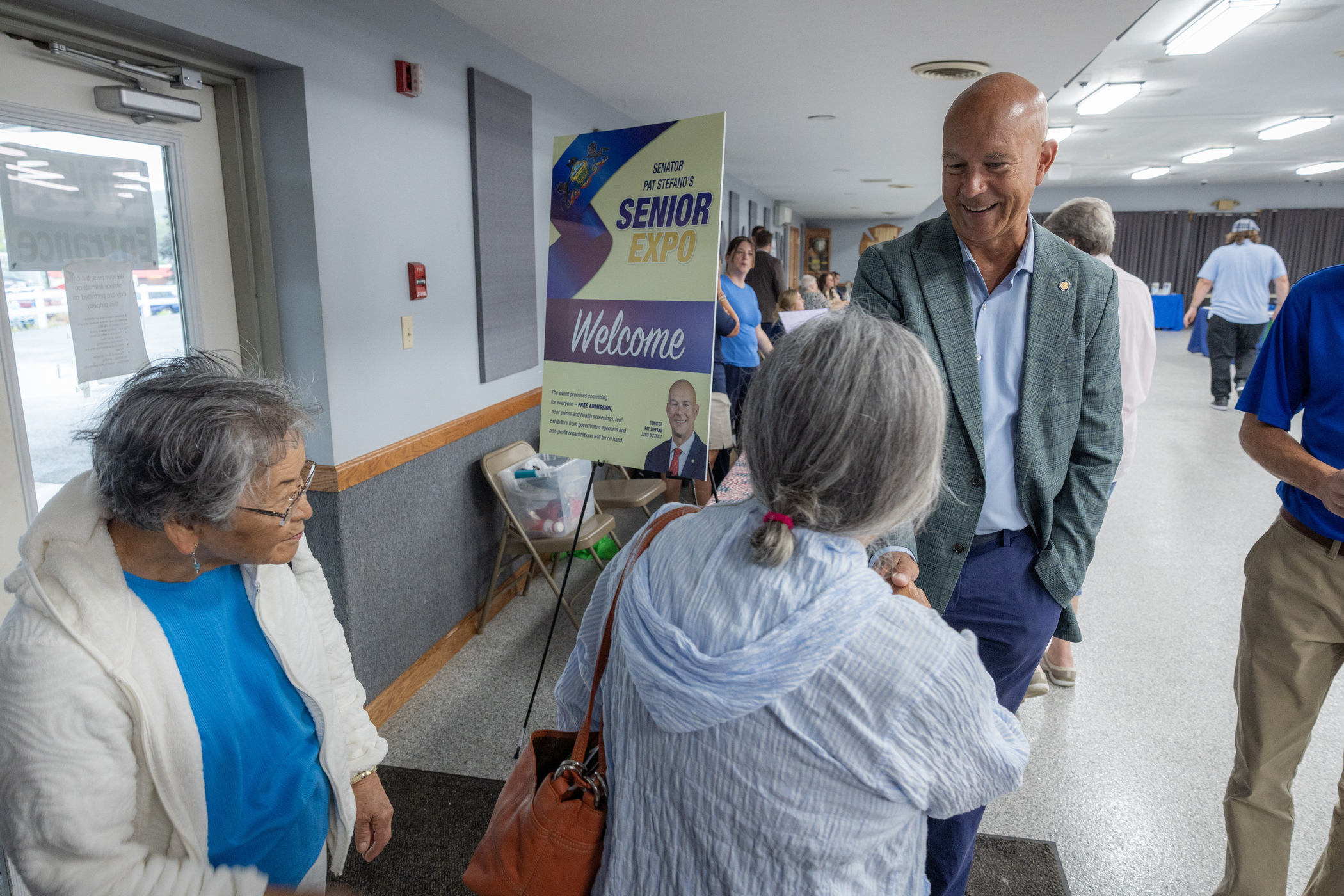 Senator Stefano greets seniors at the doors of his senior expo in Bedford County.