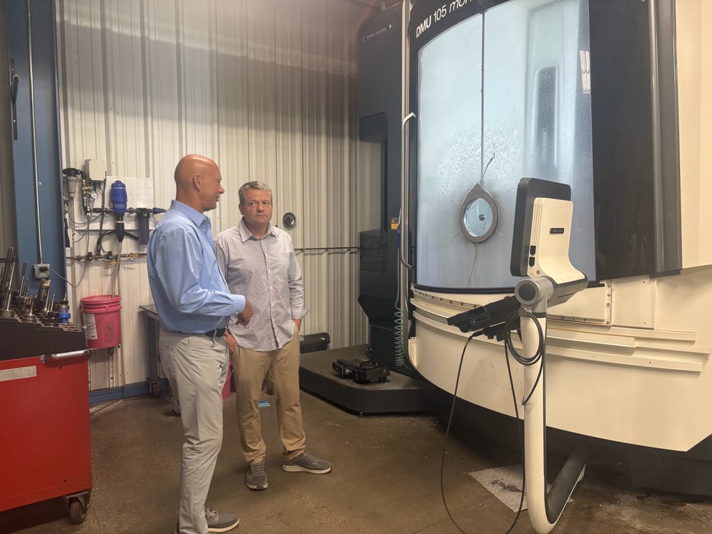 Senator Stefano observes equipment on his tour of Rifton Equipment.